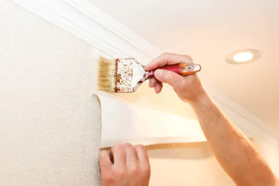 Pose de papier peint à Randevillers — revêtements muraux et toiles de verre